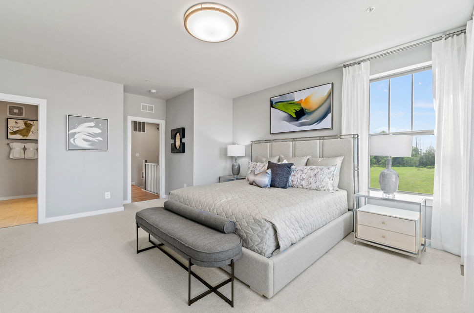 Large primary suite with walk in closets and private bath